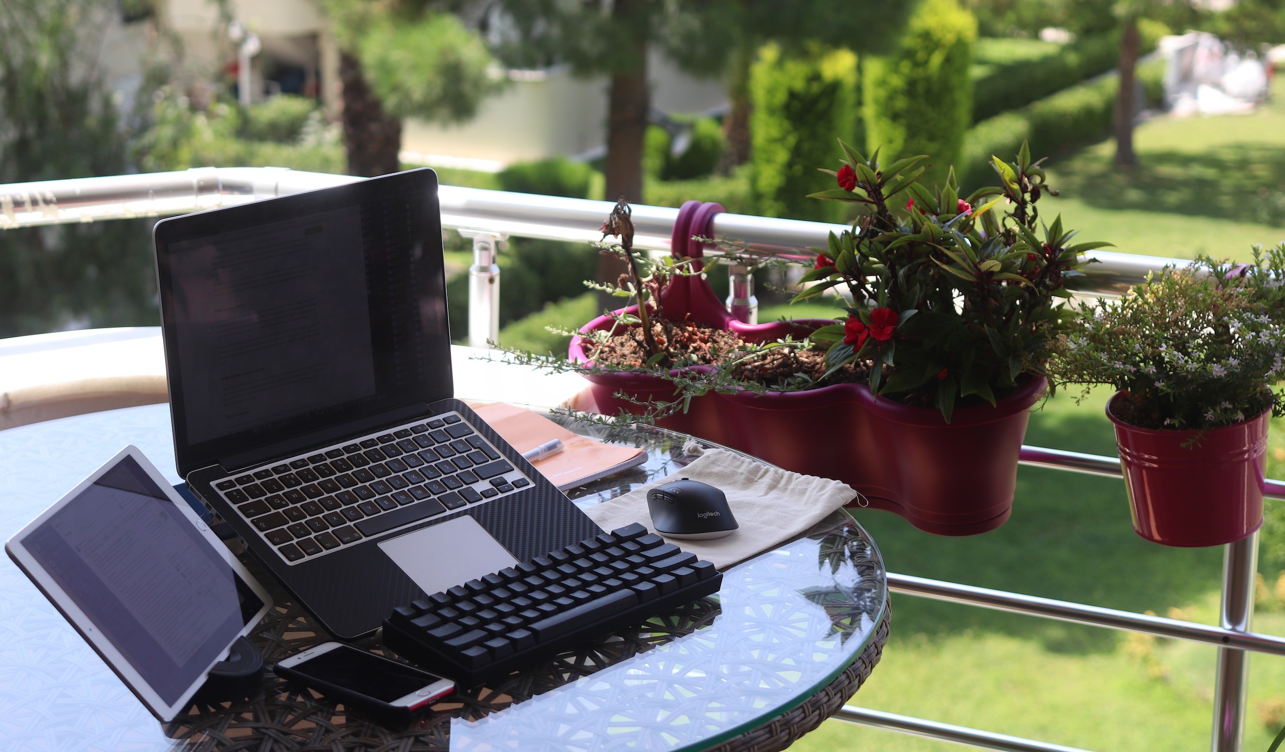 My computer setup, out on the balcony, overlooking the garden.